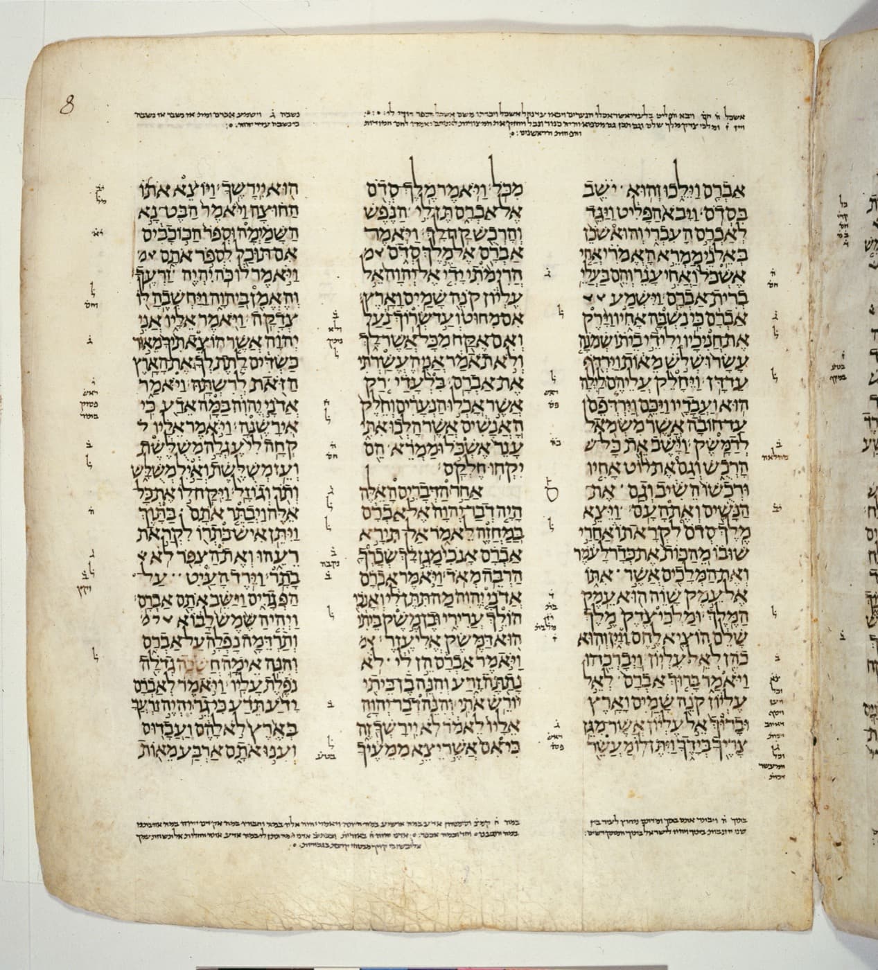 A parchment page of the Leningrad Codex with three columns of Hebrew text and notes in the margins