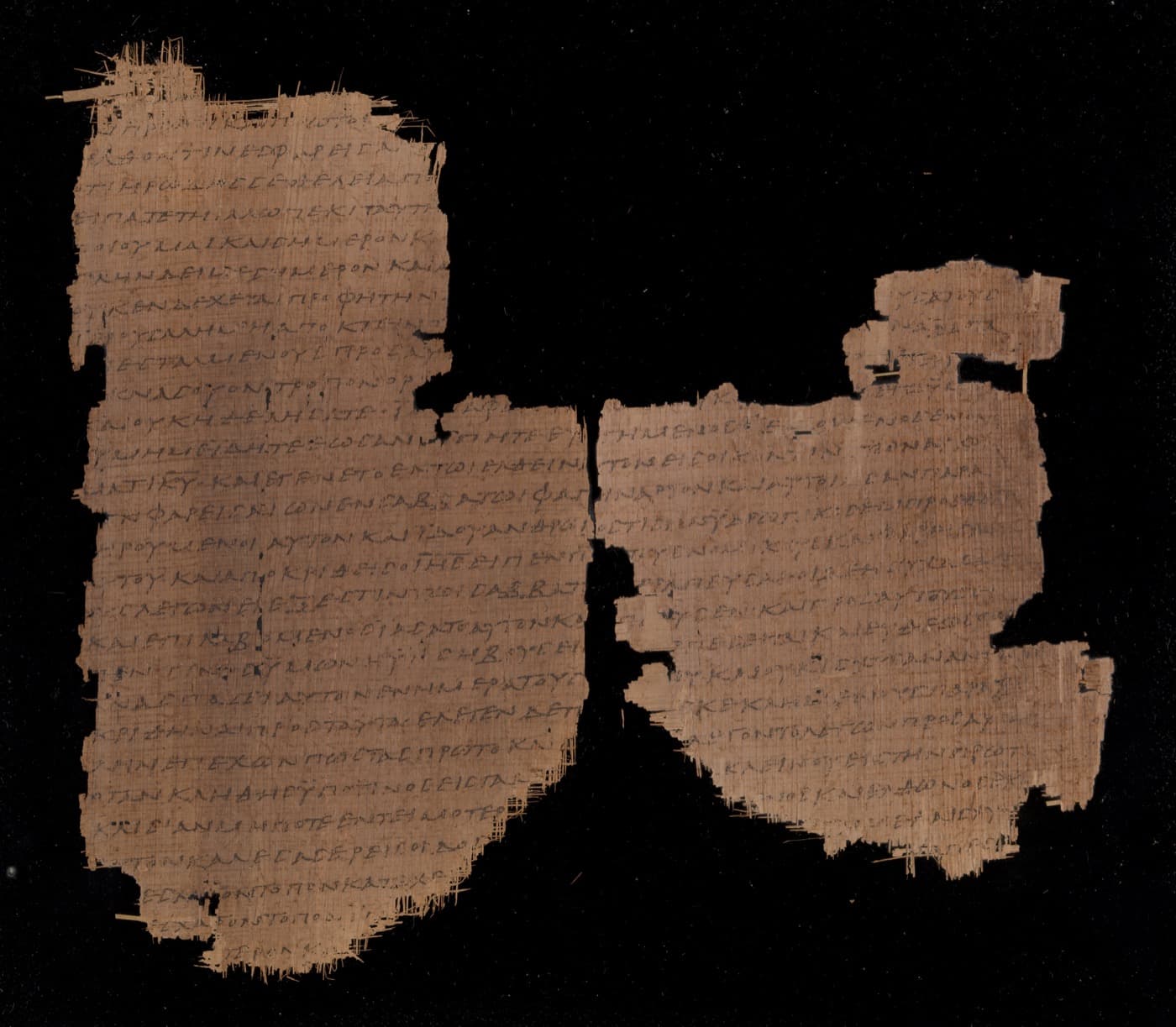 A damaged papyrus leaf of Papyrus 45 with Luke 13–14 in Greek