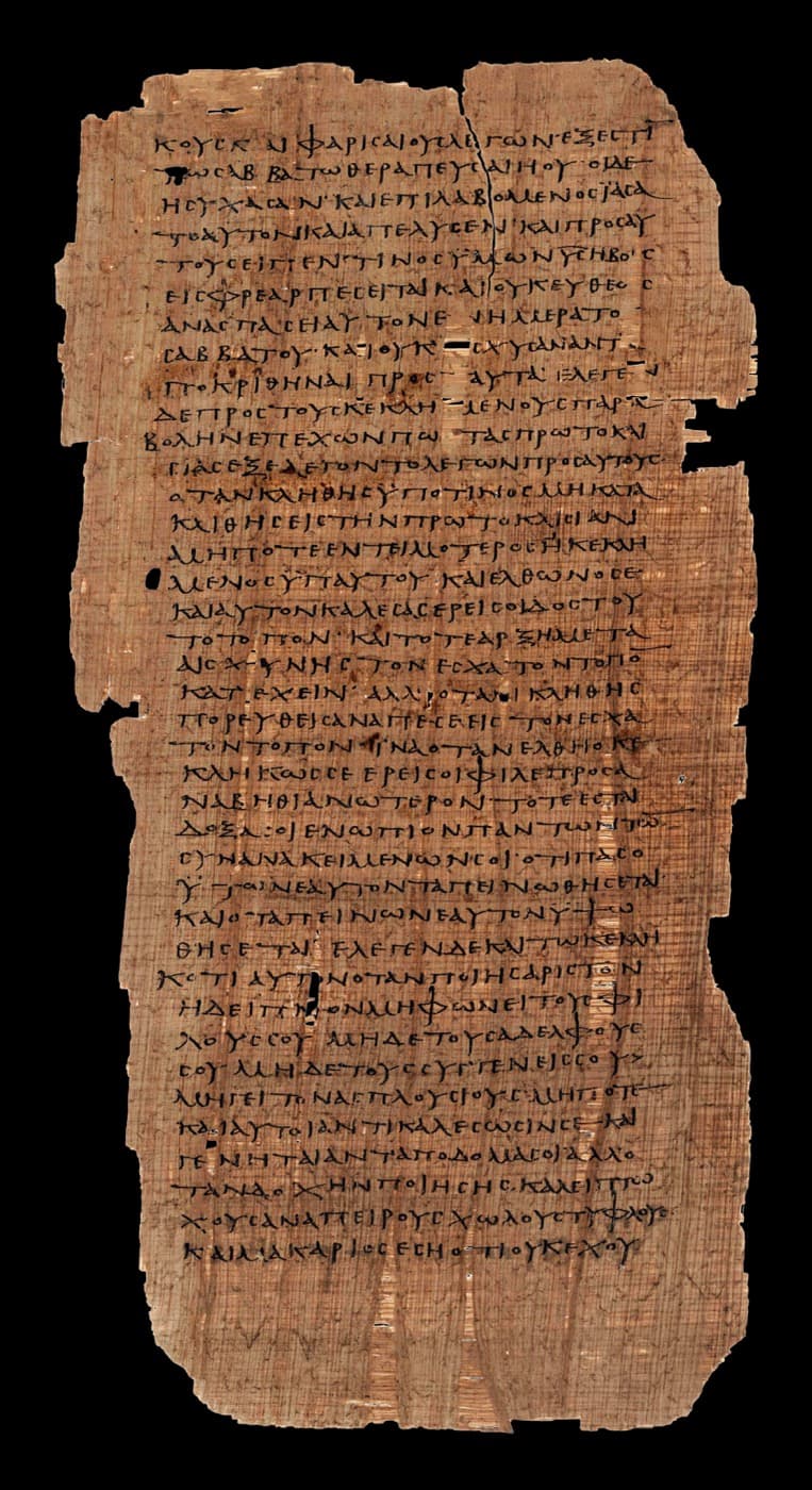A tall papyrus page of Papyrus 75 with Luke 14 in Greek