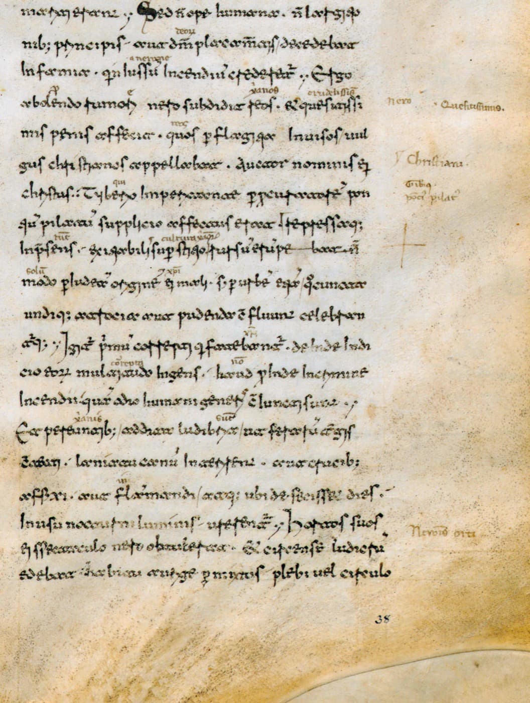 A parchment page of medieval Latin handwriting with the words Christiani and Pontius Pilatus added in the margin